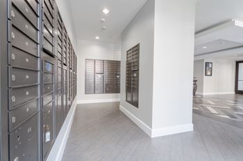 Long hallway with row of mail box